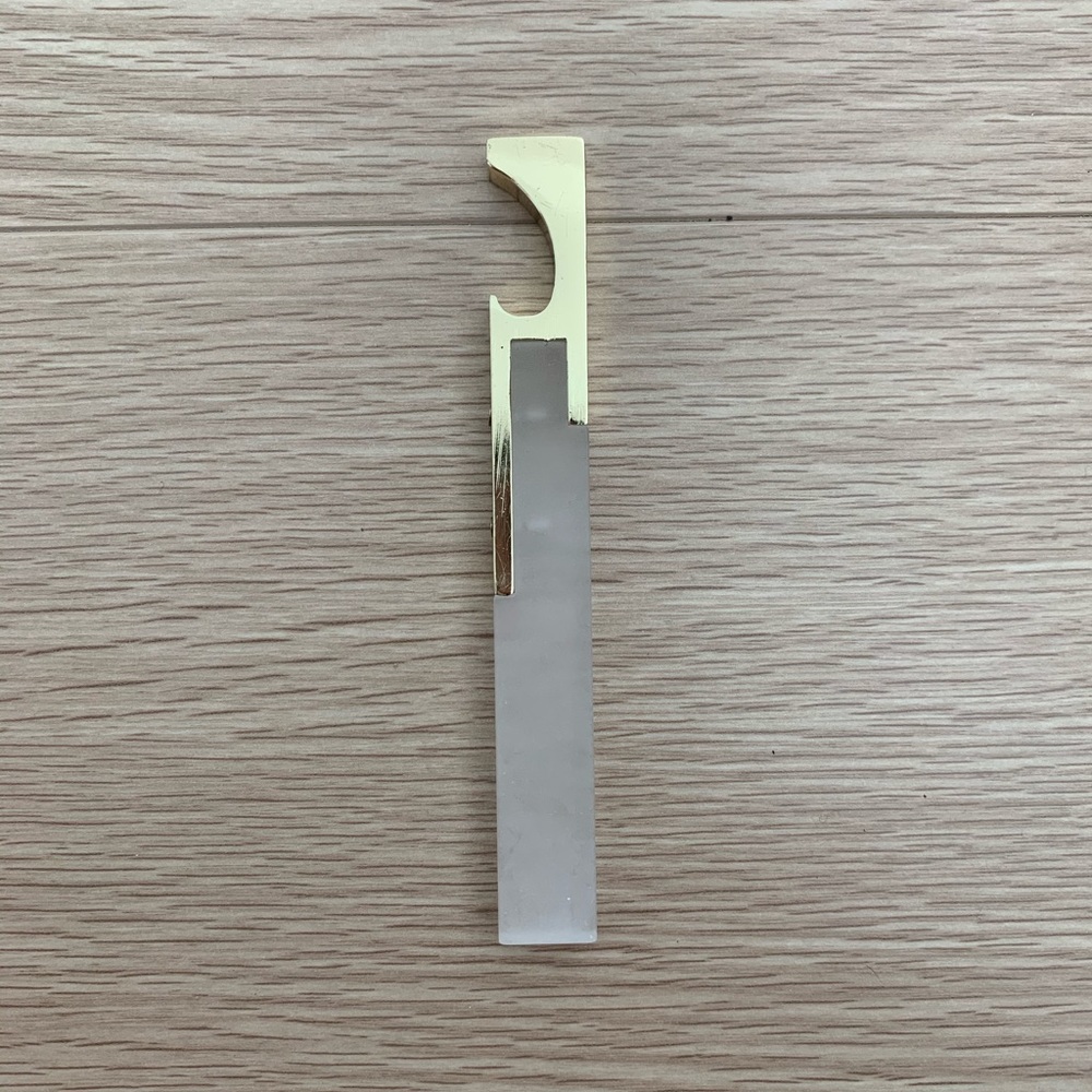 3/20$ Gold and “marble” - Bottle Opener